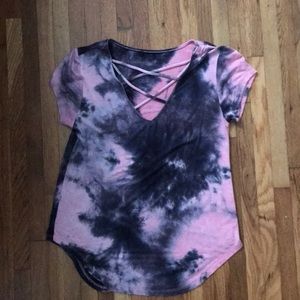 A loose tie die shirt with lacing on the front
